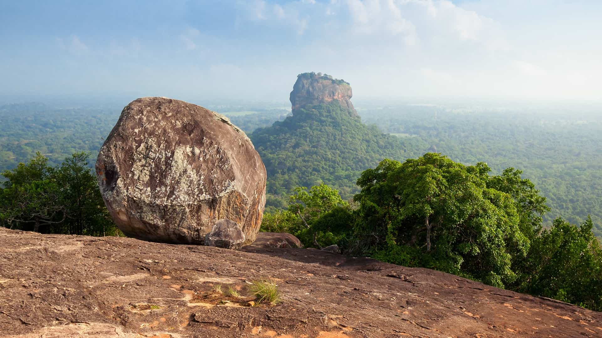 Sigiriya rock fortress in all its majesty seen from a distance